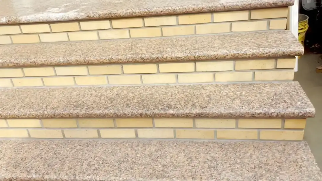 Straight-on view of the new granite treads and brick risers at 148 George Street
