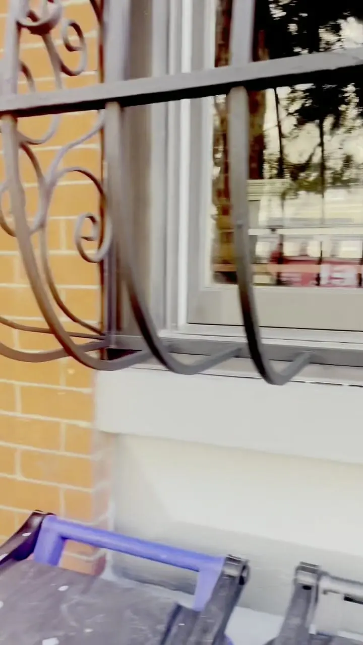 A renewed white window sill and repointed brick around a ground-floor window at 274 Hoyt Street